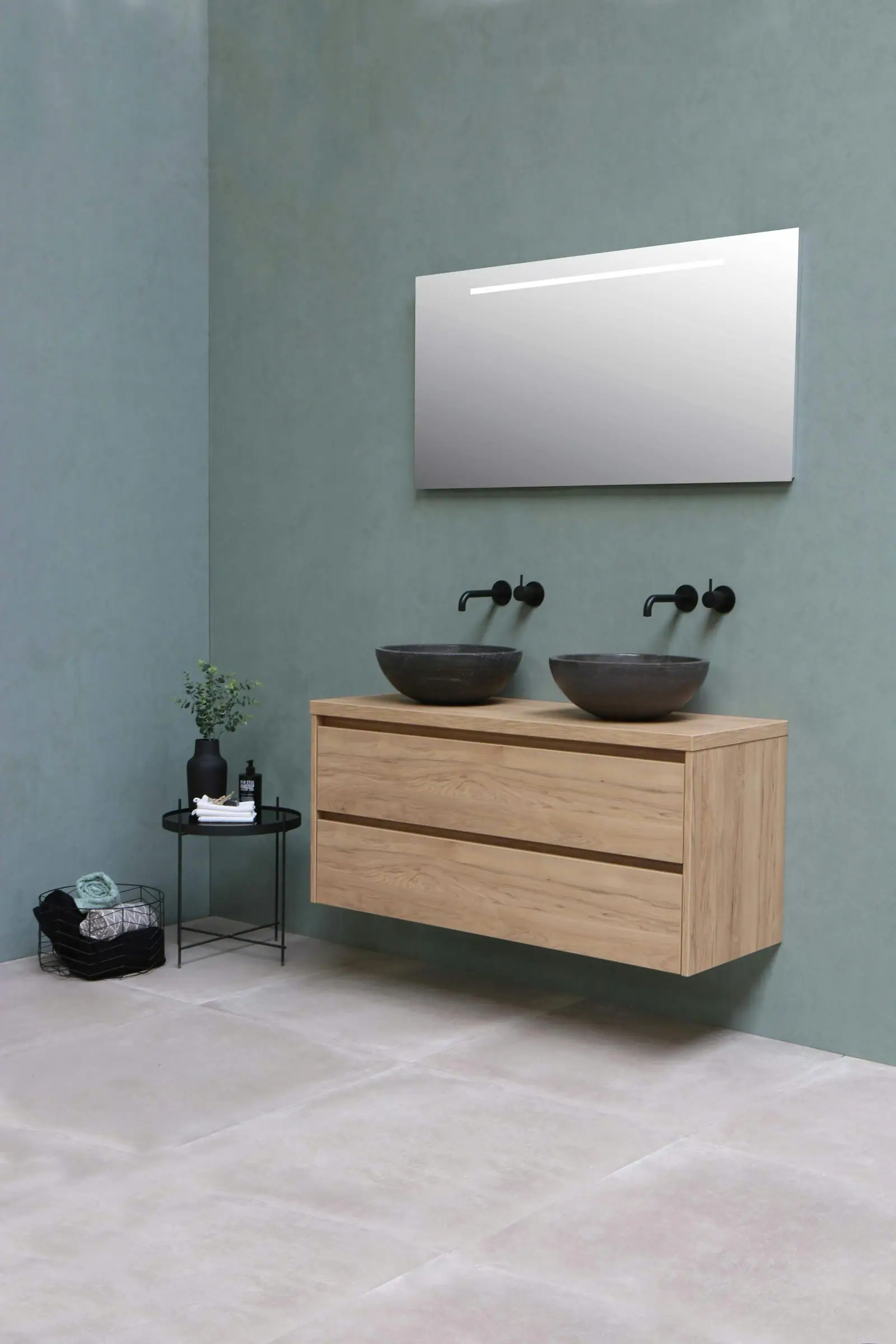 Floating oak vanity with two black vessel sinks