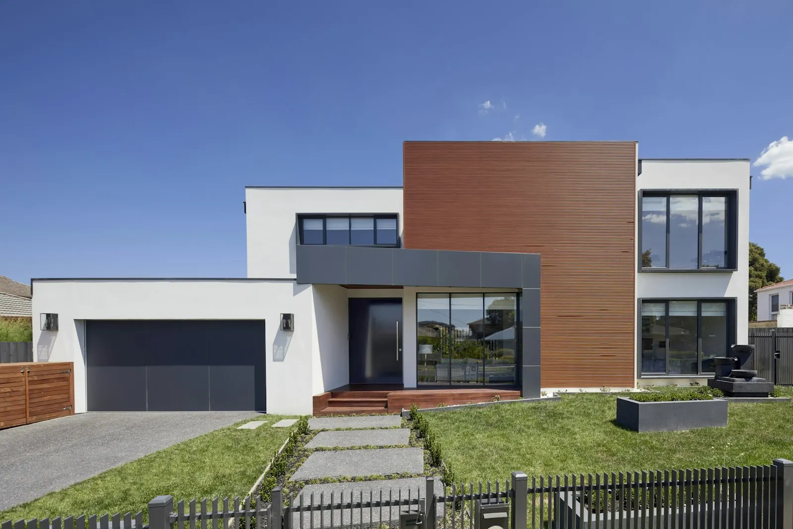 Modern two-story home with an attached two-car garage
