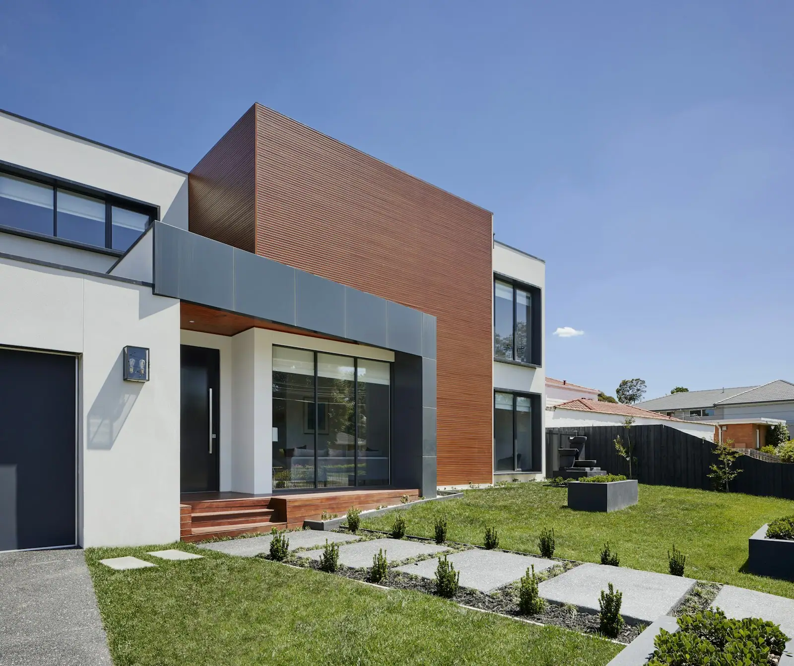Modern two-story home with wood cladding
